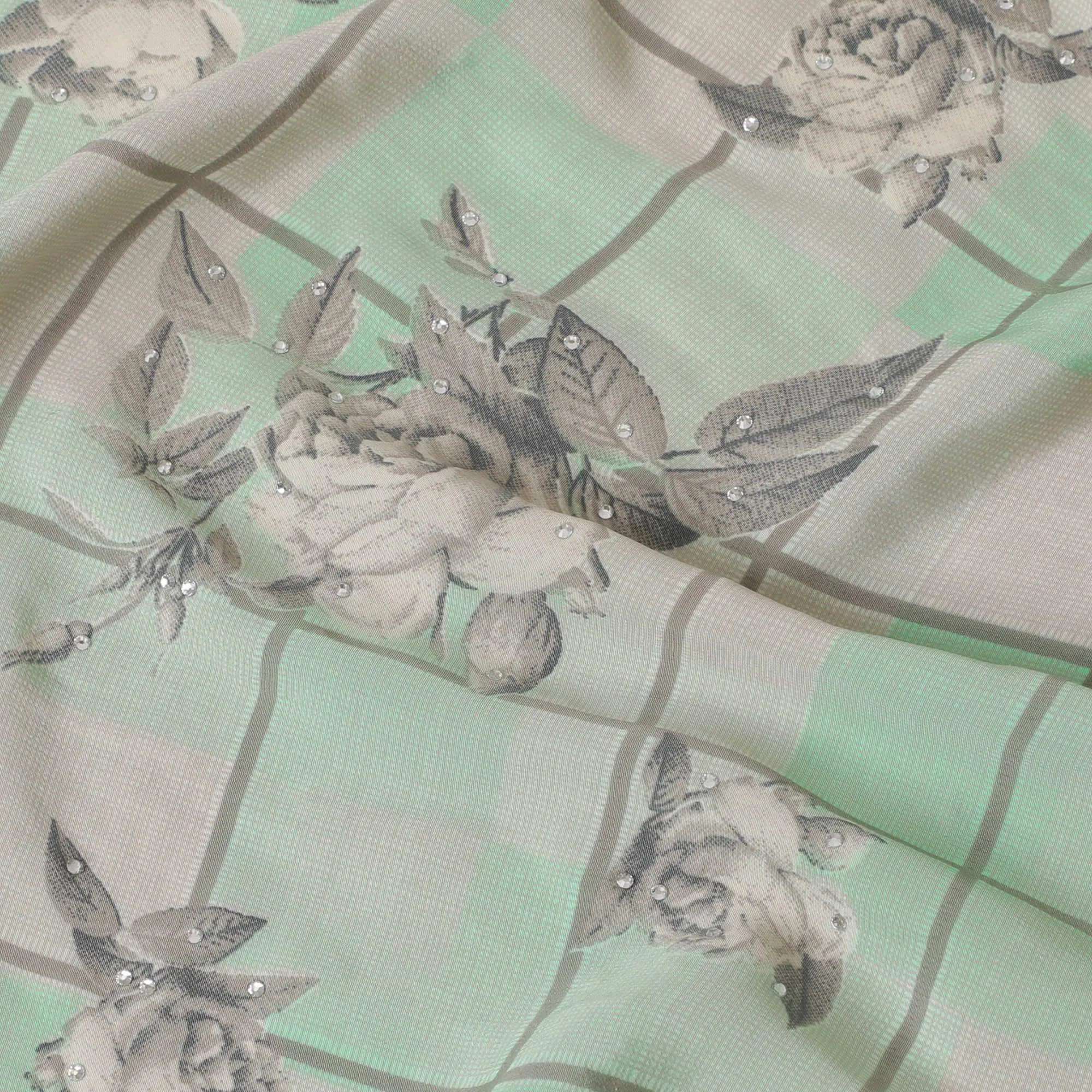 Mint green synthetic crepe fabric with beige and grey print having stone work in floral design-D15297